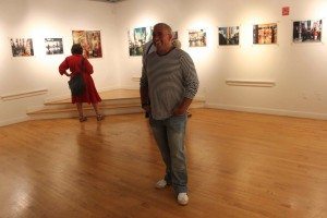 Artist Sebastian Leal smiles during the opening of his exhibit, Faroleando, at Villa Victoria Center for the Arts.